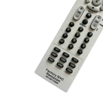 Control remoto LG MKJ39170828 con controles de volumen, canales y navegación.